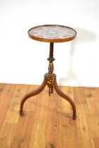 An attractive Edwardian hand painted tripod occasional table.