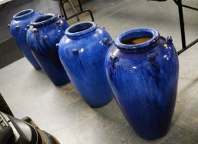 Two pairs of blue glazed stoneware garden pots