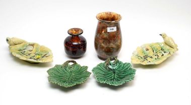 A pair of Majolica bird and leaf motif dishes