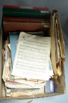 A selection of piano and other sheet music.