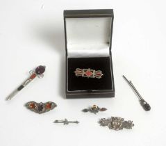 A selection of Scottish hard stone and paste set jewellery,