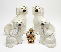 Two Victorian pairs of Staffordshire ceramic Wally/hearth dogs