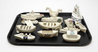 A collection of crested ceramic military interest and other model boats