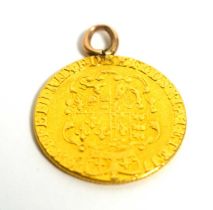 A George III gold guinea pendant, 1776,