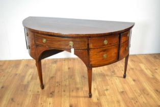 A late Georgian inlaid mahogany demi lune sideboard