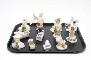 A collection of crested ceramic statues