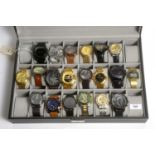 Watch collectors cabinet containing twenty various gent wristwatches