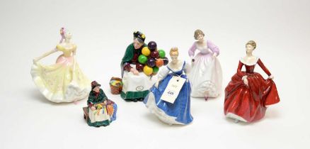 A collection of Royal Doulton ceramic figures