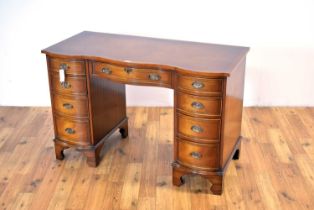 Bevan Funnell: A Georgian-style mahogany serpentine writing desk retailed by Chapmans, Newcastle