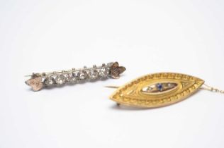 A Victorian Etruscan revival 9ct gold brooch, and another