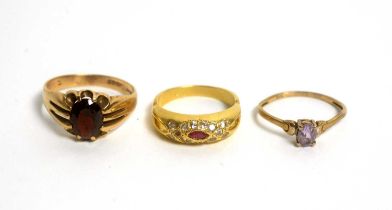 Three rings, set gemstones