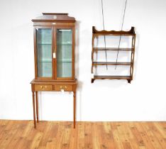 An Edwardian-style display cabinet on stand; and hanging wall shelves