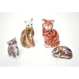 Four Royal Crown Derby cat paperweights