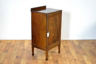 An early 20th Century mahogany music cabinet