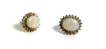 A pair of opal and diamond cluster earrings