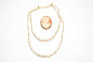 A carved shell cameo brooch, and Ciro necklace