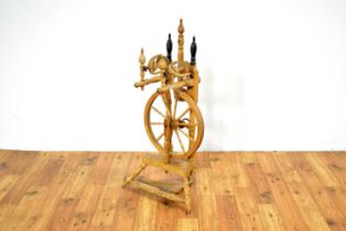 A vintage elm spinning wheel