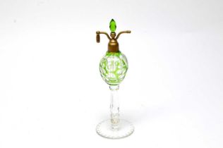 A 19th Century green overlaid cut glass scent bottle