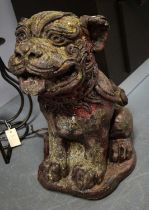 A Chinese carved stone Buddhist lion garden ornament