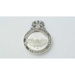 A late Victorian Scottish silver school prize medal