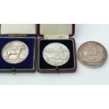 Three silver agricultural prize medals