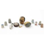 ﻿﻿Two enamel silver thimbles and other thimbles, Victorian tape measures and other items