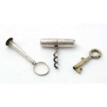 A late Victorian silver mounted pocket corkscrew; and other items
