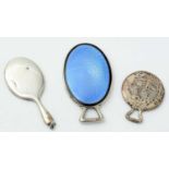 Three silver miniature or toy hand mirrors