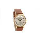 Patek Philippe, Geneve: an 18ct yellow gold-cased automatic wristwatch