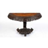 A 19th Century Anglo Indian carved demi lune table