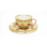 Royal Worcester reticulated cabinet cup and saucer in the manner of George Owen
