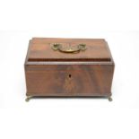 An early 19th Century mahogany tea caddy