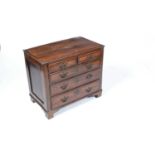 An 18th Century oak and mahogany banded chest