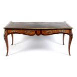 A Louis XVI-style kingwood and coromandel writing desk