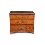 A burr walnut and feather banded secretaire chest with sunburst motif