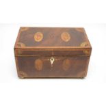 An early 19th Century inlaid mahogany tea caddy