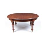 A Victorian mahogany oval extending dining table