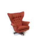 G Plan Model 6250: a 20th Century button back swivel armchair