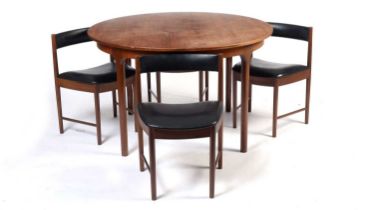 After Frem Rojle: a mid-Century teak extending dining table and chairs