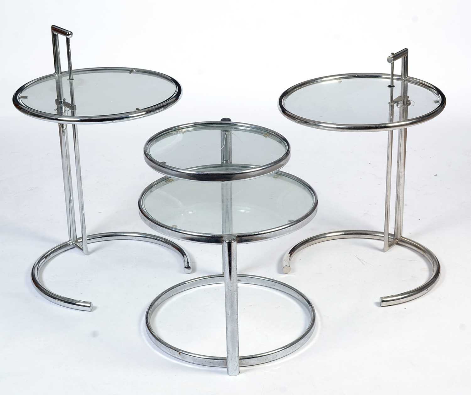 After Eileen Gray: three circular chrome and glass occasional tables - Image 2 of 2