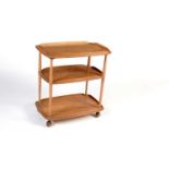 Ercol: Model no 3 a mid-Century beech and elm three tier drinks trolley