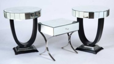 A pair of glass and ebonised wood occasional tables