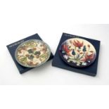 Moorcroft 2001 year plate, and another boxed.