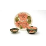Moorcroft Hibiscus bowl and cover, plate and small bowl