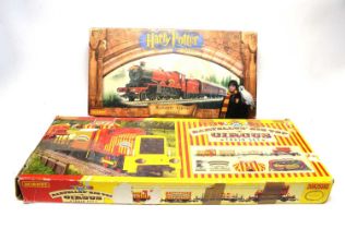 Hornby Hogwarts Express and Bartellos' Big Top Circus electric train sets.