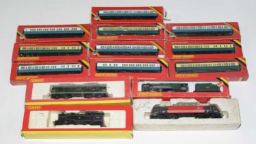 Fourteen Hornby 00-gauge locomotives, rolling stock and tenders