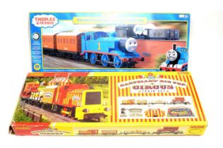 Hornby 'Bartellos' Big Top Circus' and 'Thomas Passenger and Goods' electric train sets.