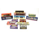Selection of 00-gauge boxed trains and wagons, various makers.