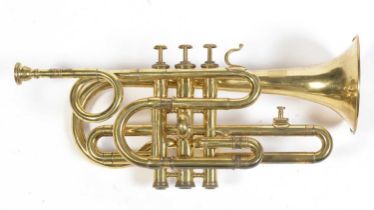 A brass cornet by Joseph Wallace London.