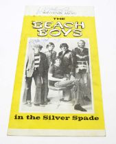 A souvenir menu signed by 3 members of The Beach Boys